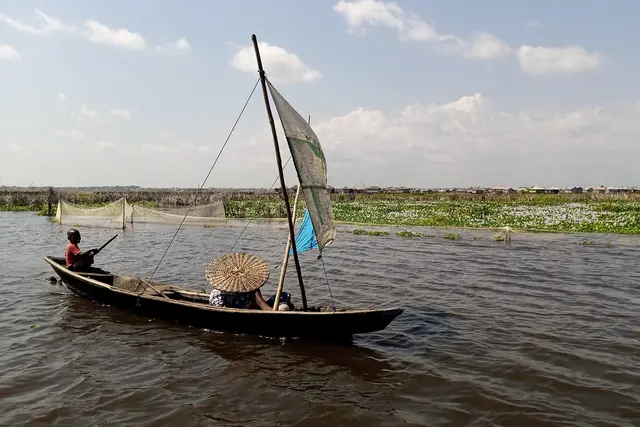 Sailing pirogue or outrigger pirogue of the Beninese type on the Ganvié River in Benin
