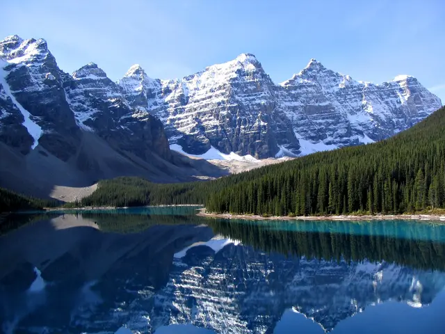 Moraine Lake reflecting the snow-capped Valley of the Ten Peaks in Banff National Park