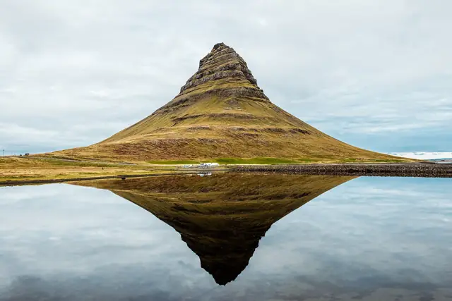 Kirkjufell mountain reflected in still water on the Snæfellsnes peninsula in west Iceland