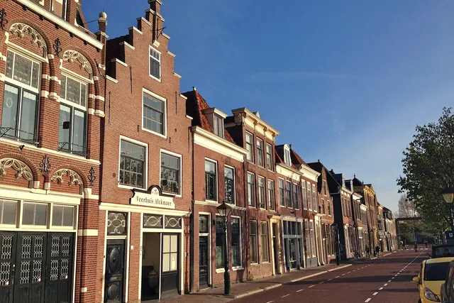 Gabled houses along the Bierkade canal in Alkmaar on an early morning