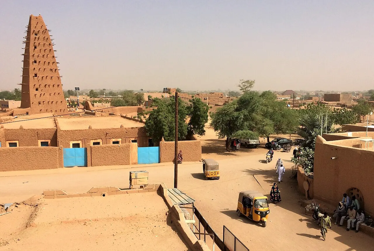 The Grand Mosque and the surrounding streets of the historic centre of Agadez, Niger, seen from a rooftop terrace