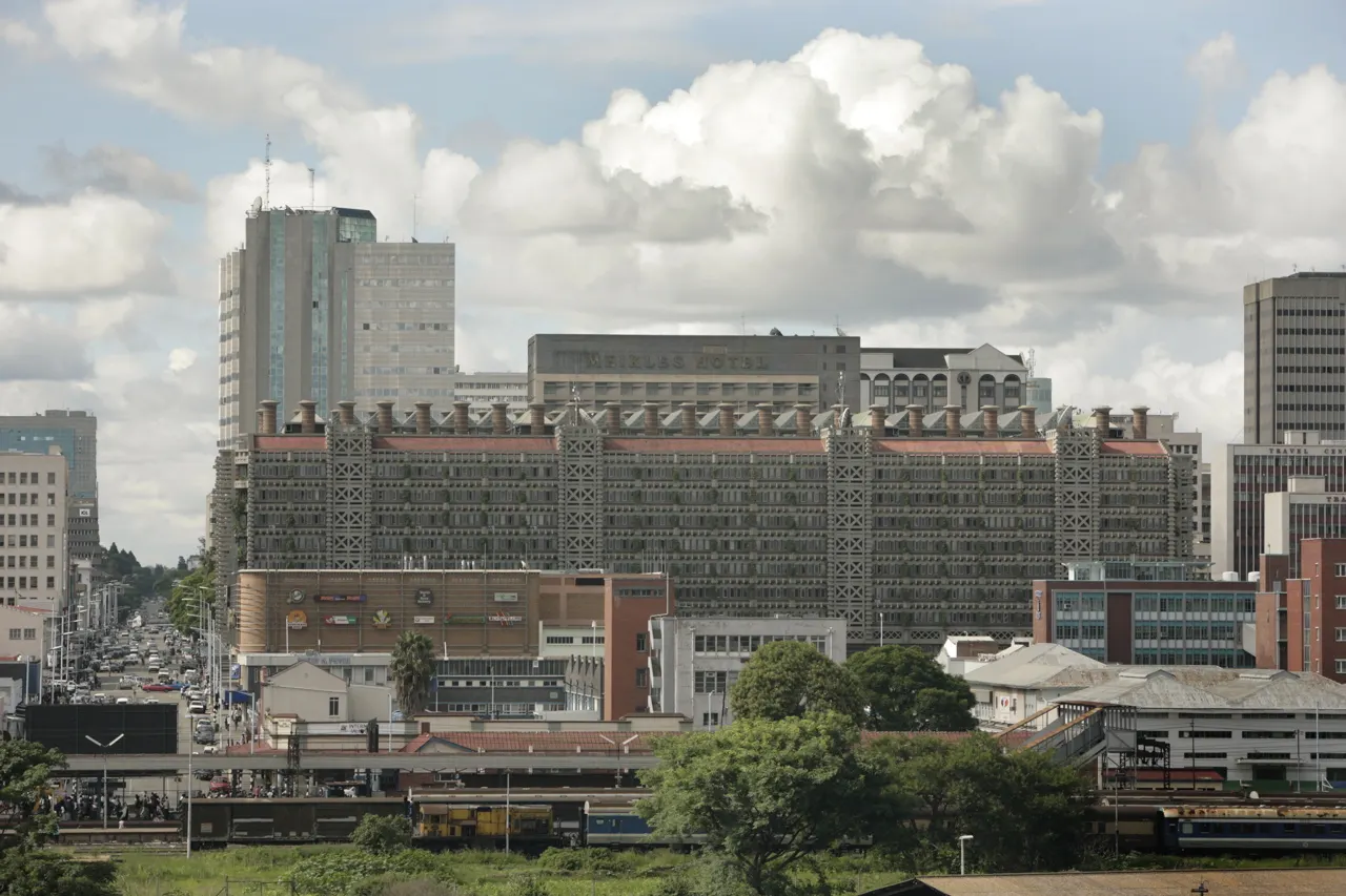 Eastgate Centre, Harare, Zimbabwe (foreground, the building with the large number of chimneys on top)